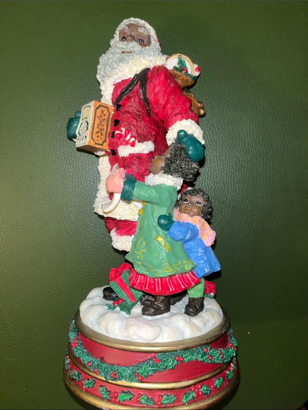 Festive Santa Figurine with Child - Red and Green Holiday Accent